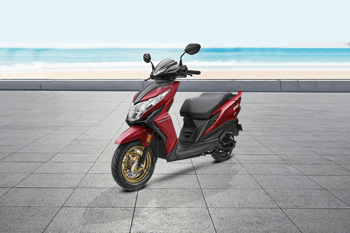 Honda dio deluxe on best sale road price